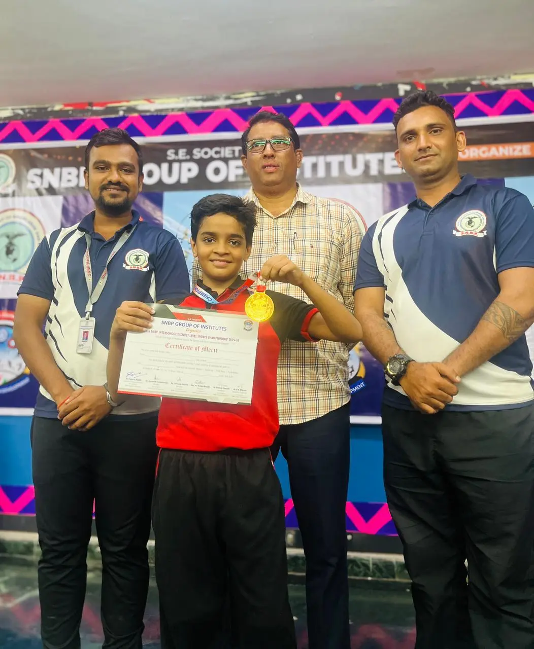 Young chess student winning tournament medal